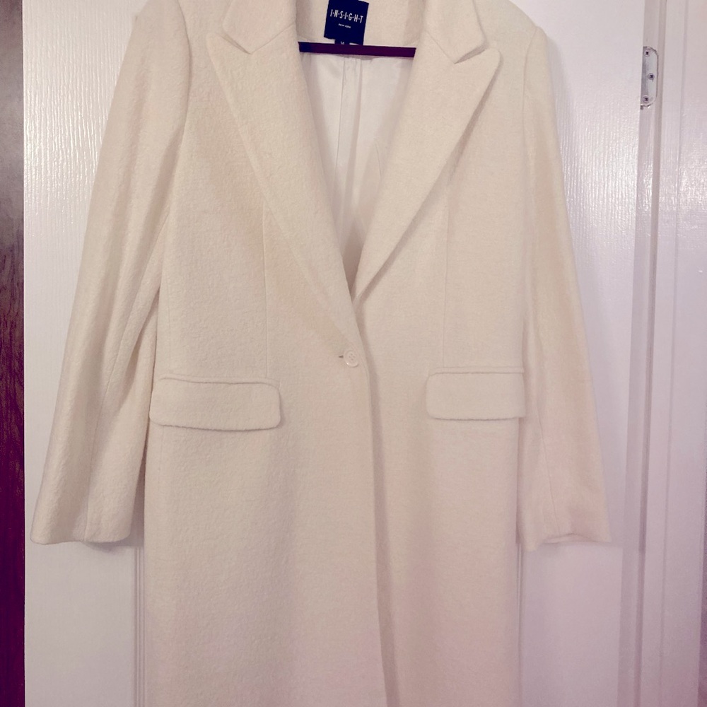 New. Light coat. Knee length.